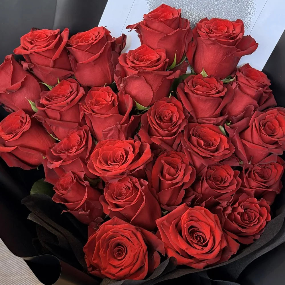 24 luxury red roses bouquet close-up product shot wrapped in black paper, Sydney same-day luxury red rose delivery by Vhouse Florist