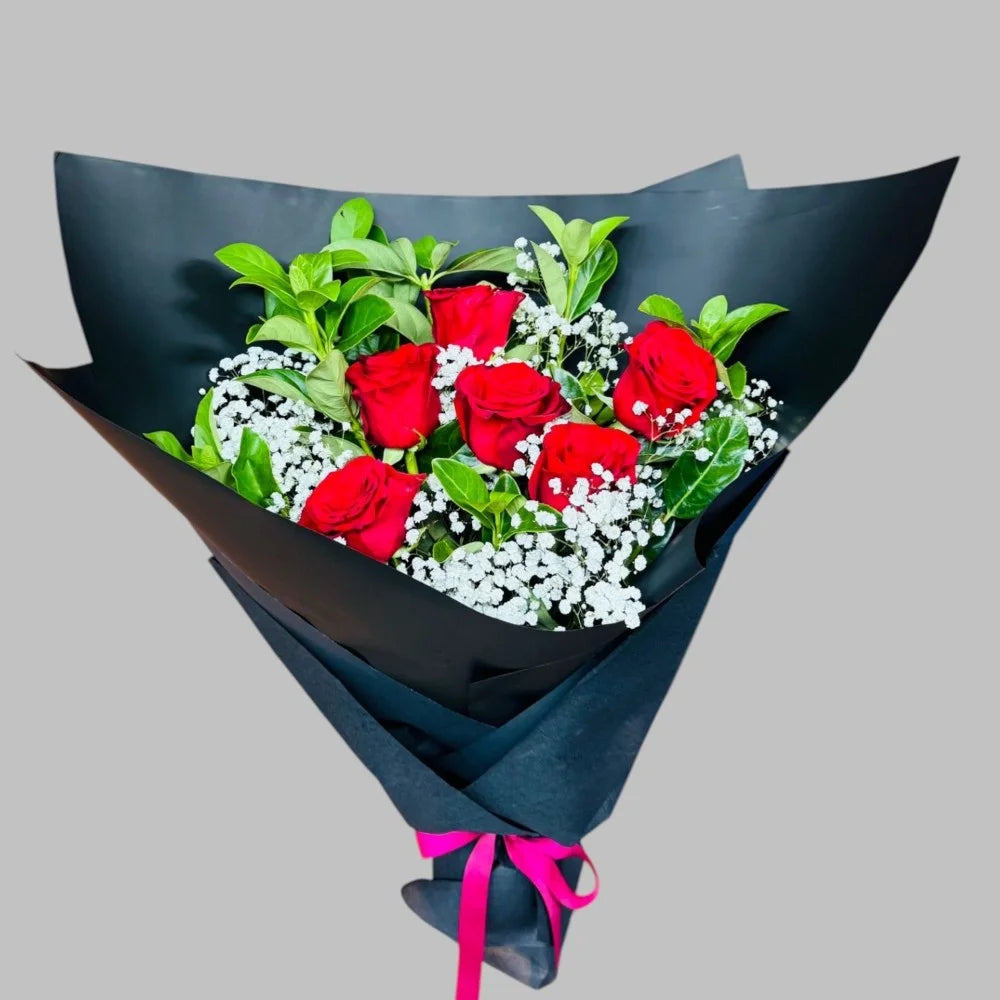 6 red roses bouquet with baby's breath and green leaves wrapped in black paper with pink ribbon, Sydney same-day luxury red rose delivery by Vhouse Florist
