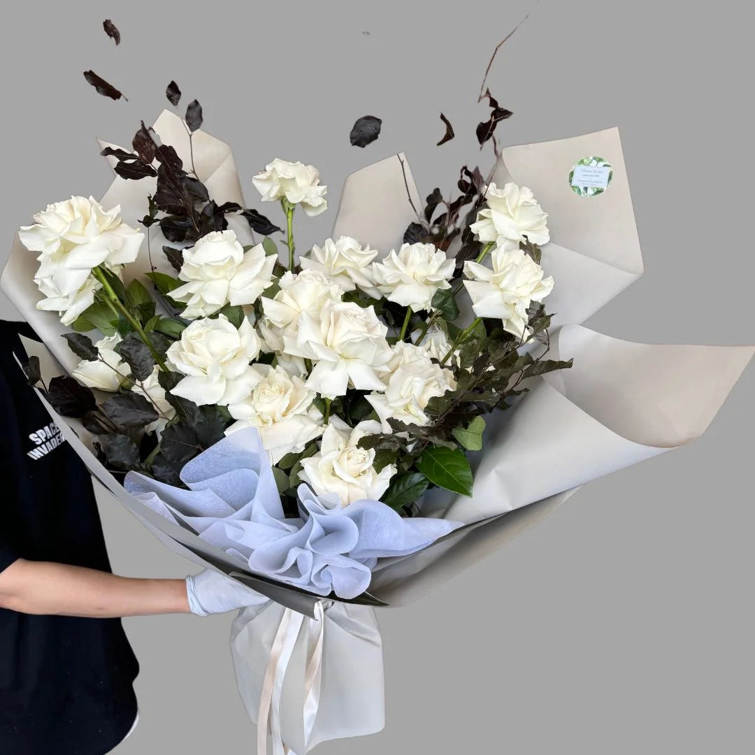 12 stem bouquet of white columbian roses