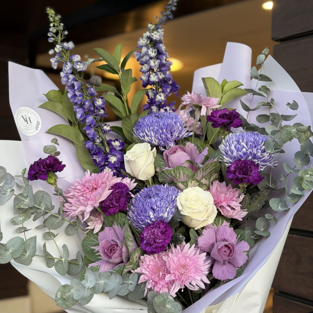 Close-up of purple Mother's Day bouquet with delphiniums, roses and chrysanthemums, flower delivery Sydney Vhouse Florist