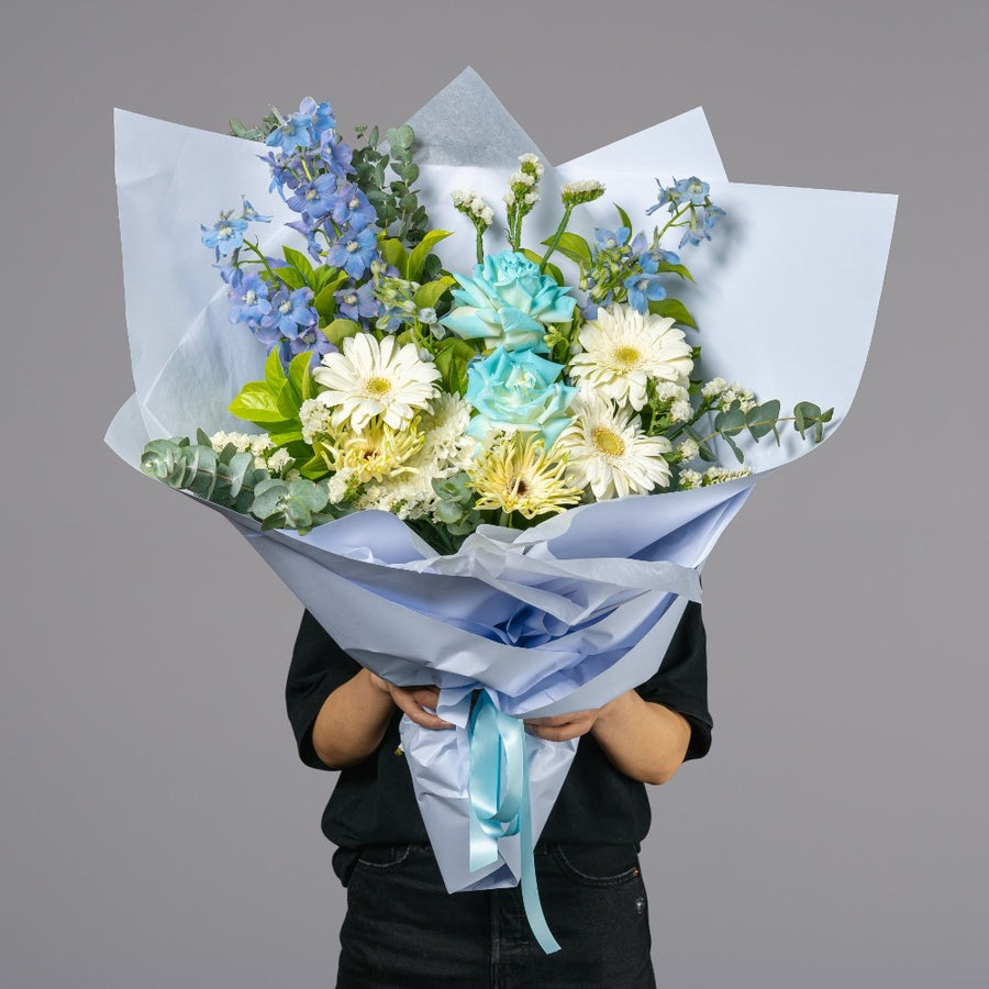 Blue Sky blue and white flower bouquet