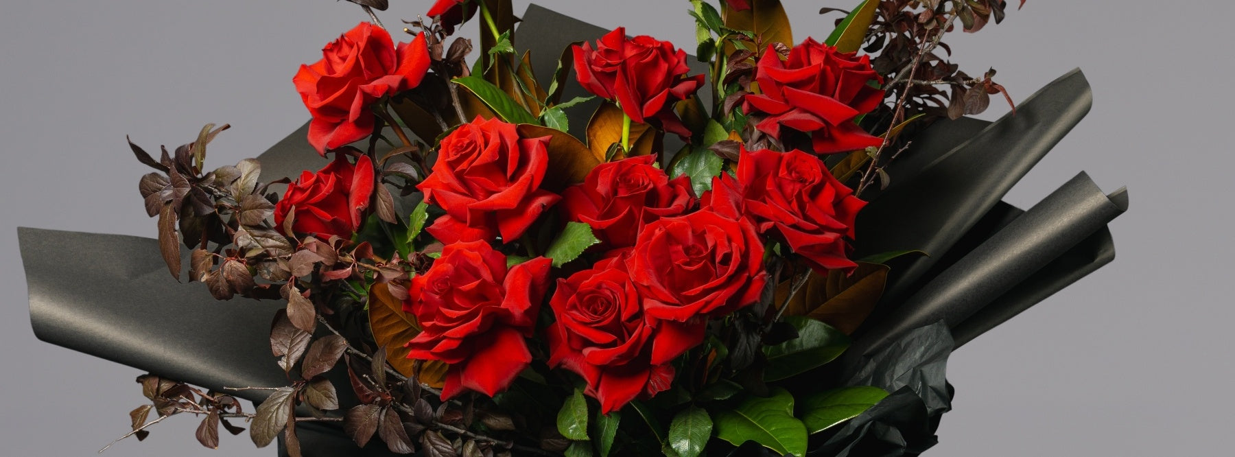 Red rose bouquet with greenery