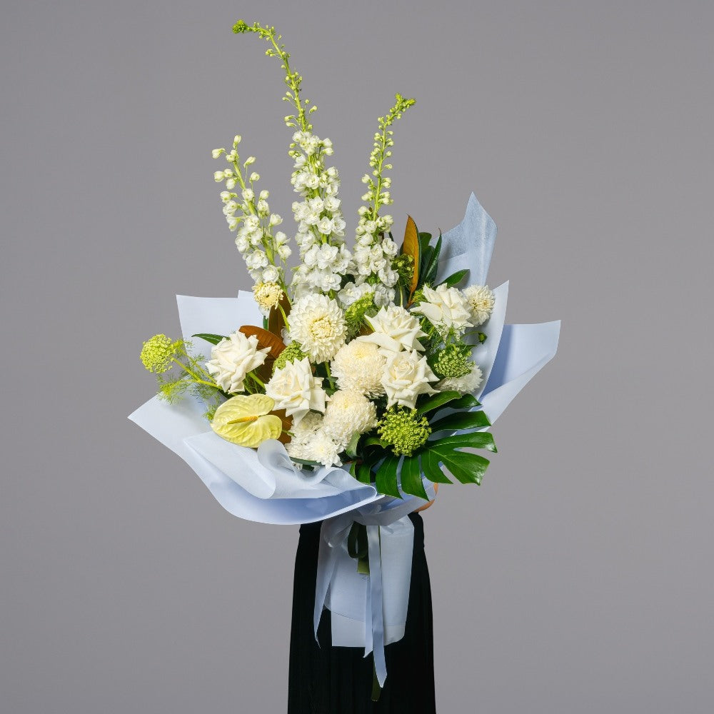 Grand Pearl Meadow Bouquet of seasonal white flowers with greenery