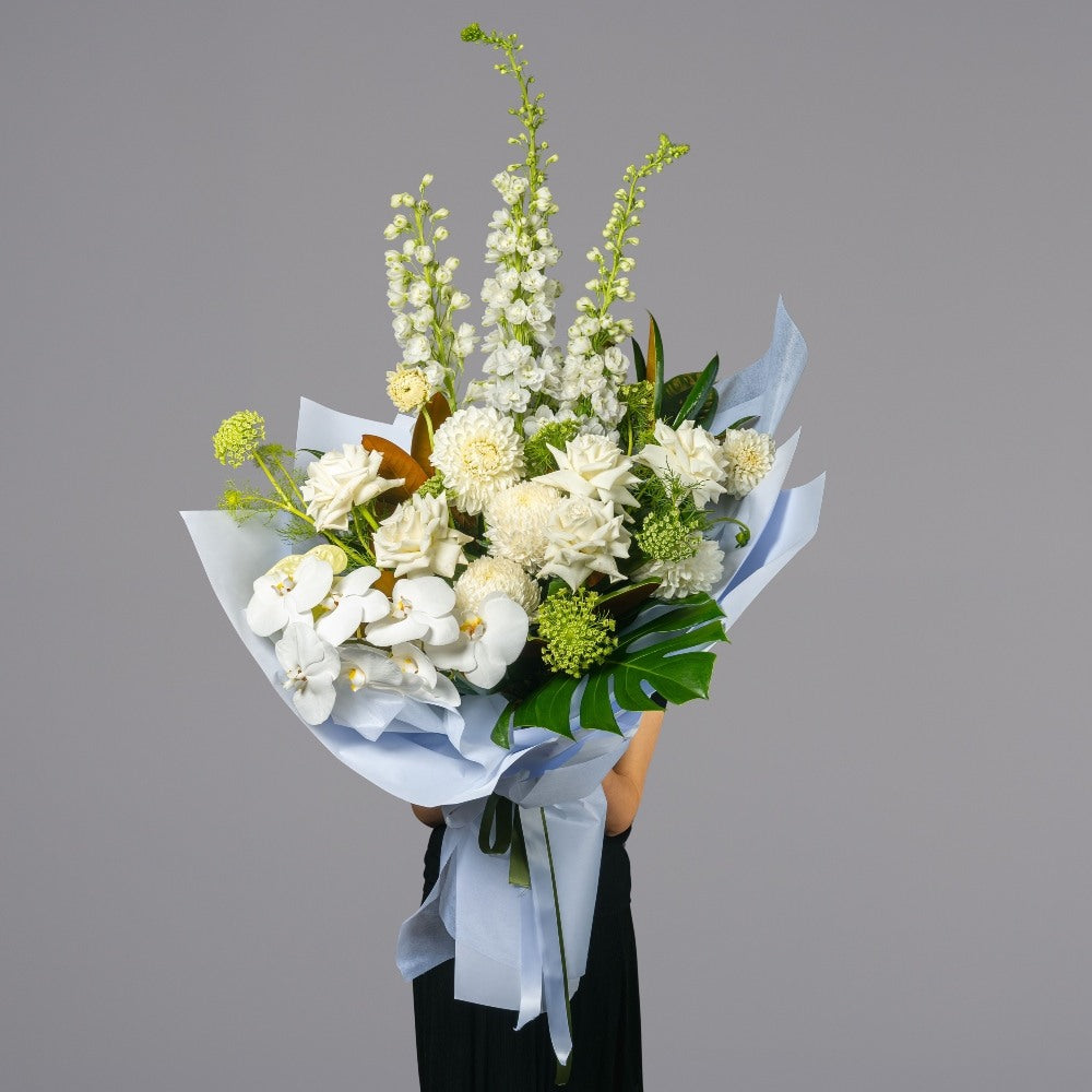 Luxury Pearl Meadow Bouquet of seasonal white flowers with greenery and phally