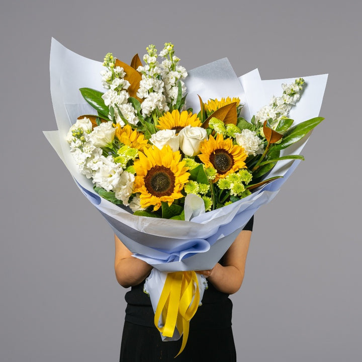 Sunflower and white flowers bouquet