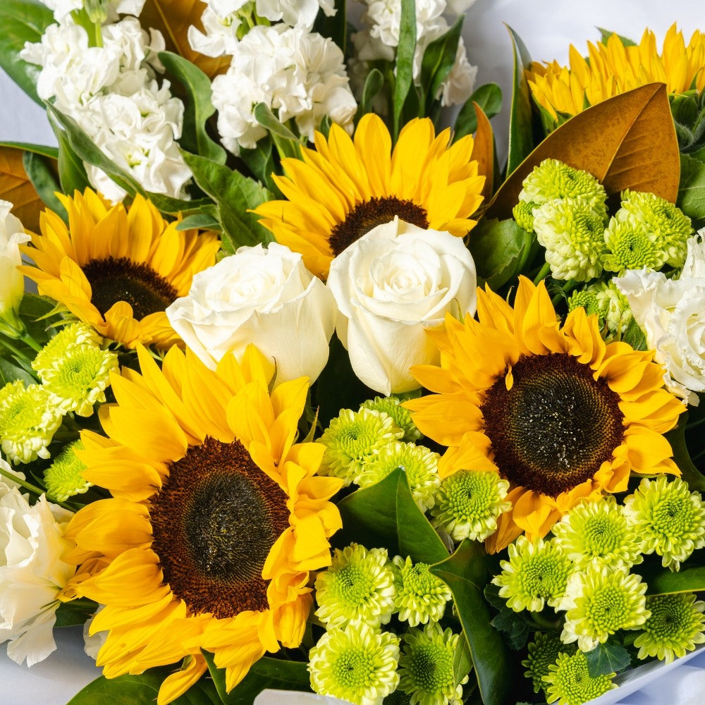 Sunflower and white flower bouquet