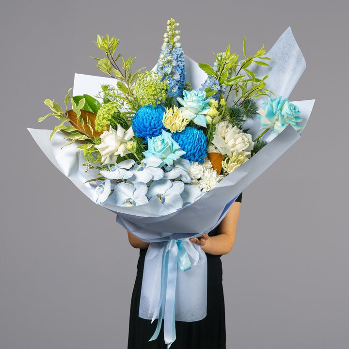 Classic Blue Sky bouquet with soft blue and white flowers from Vhouse Florist