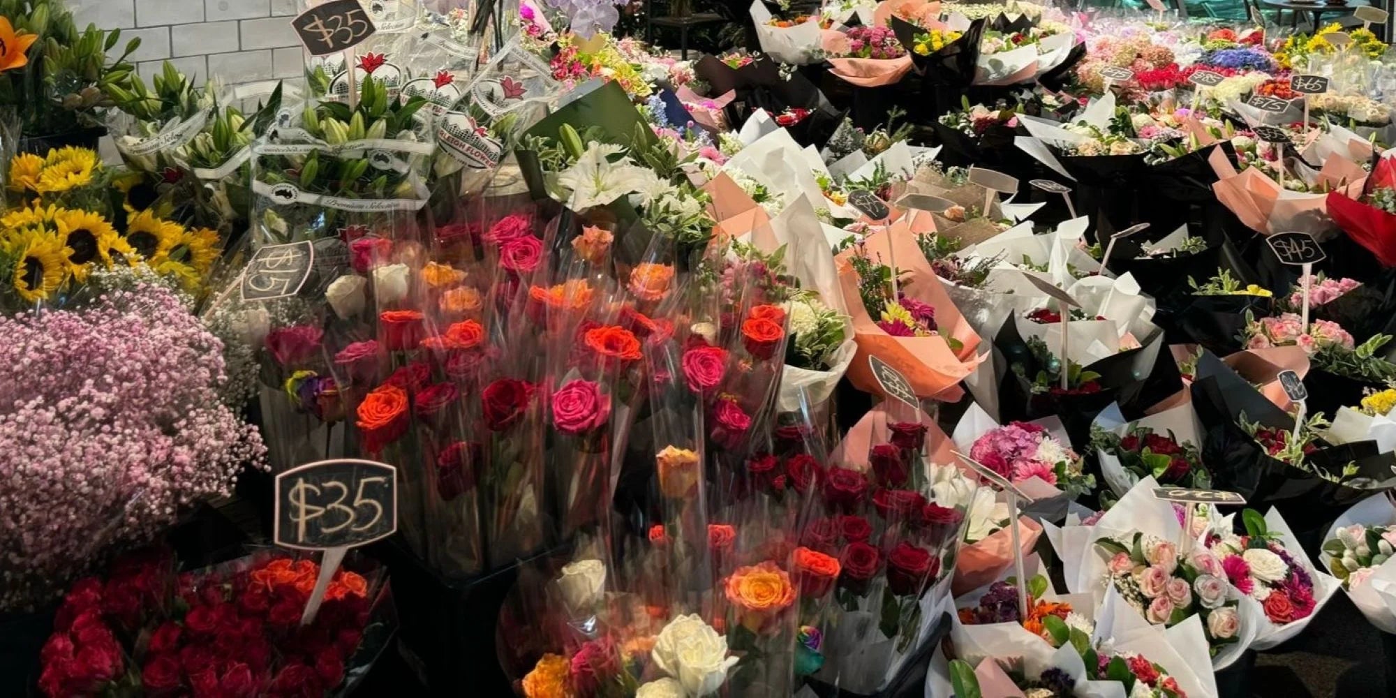 Vhouse Florist shop display of fresh flower bouquets including roses, sunflowers and seasonal mixed flowers in vibrant colours, Sydney flower shop and same-day flower delivery by Vhouse Florist
