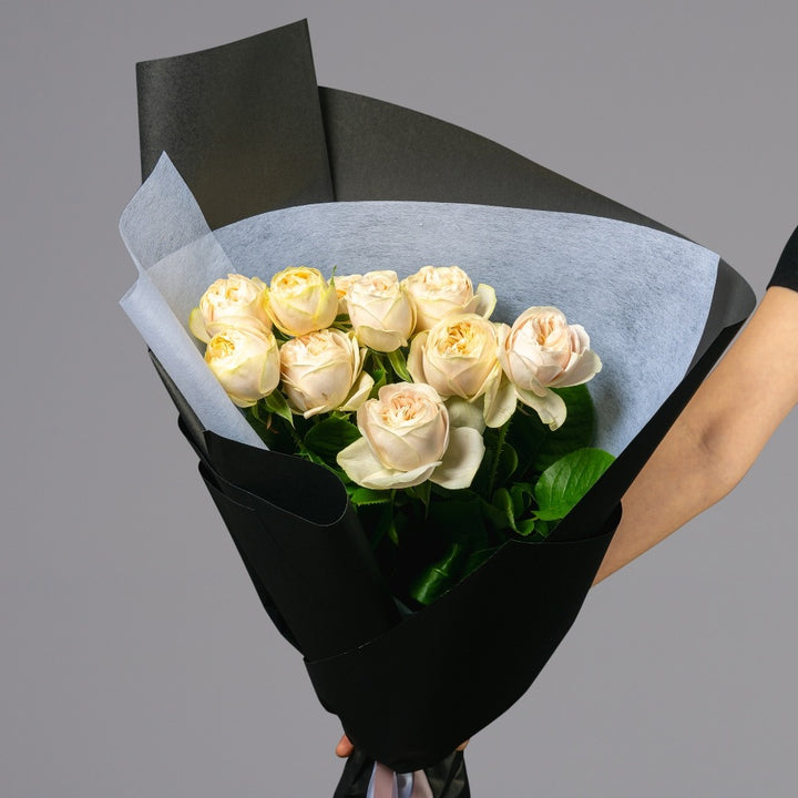 10 stem bouquet of light pastel yellow roses
