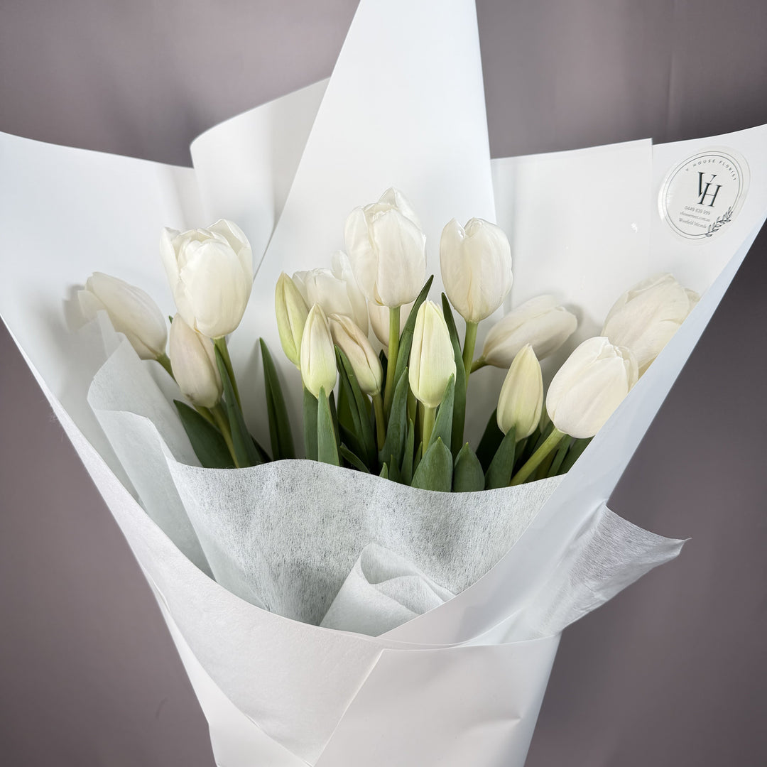 Ivory white tulip wrapped bouquet