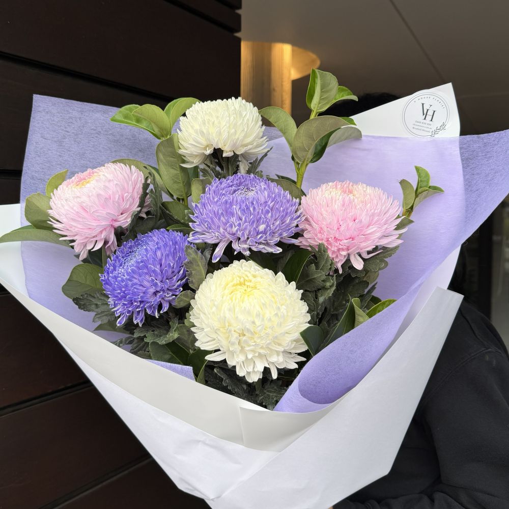 Luxury chrysanthemum bouquet with purple, soft pink and cream flowers wrapped in white and purple paper, Vhouse Florist Sydney same-day delivery