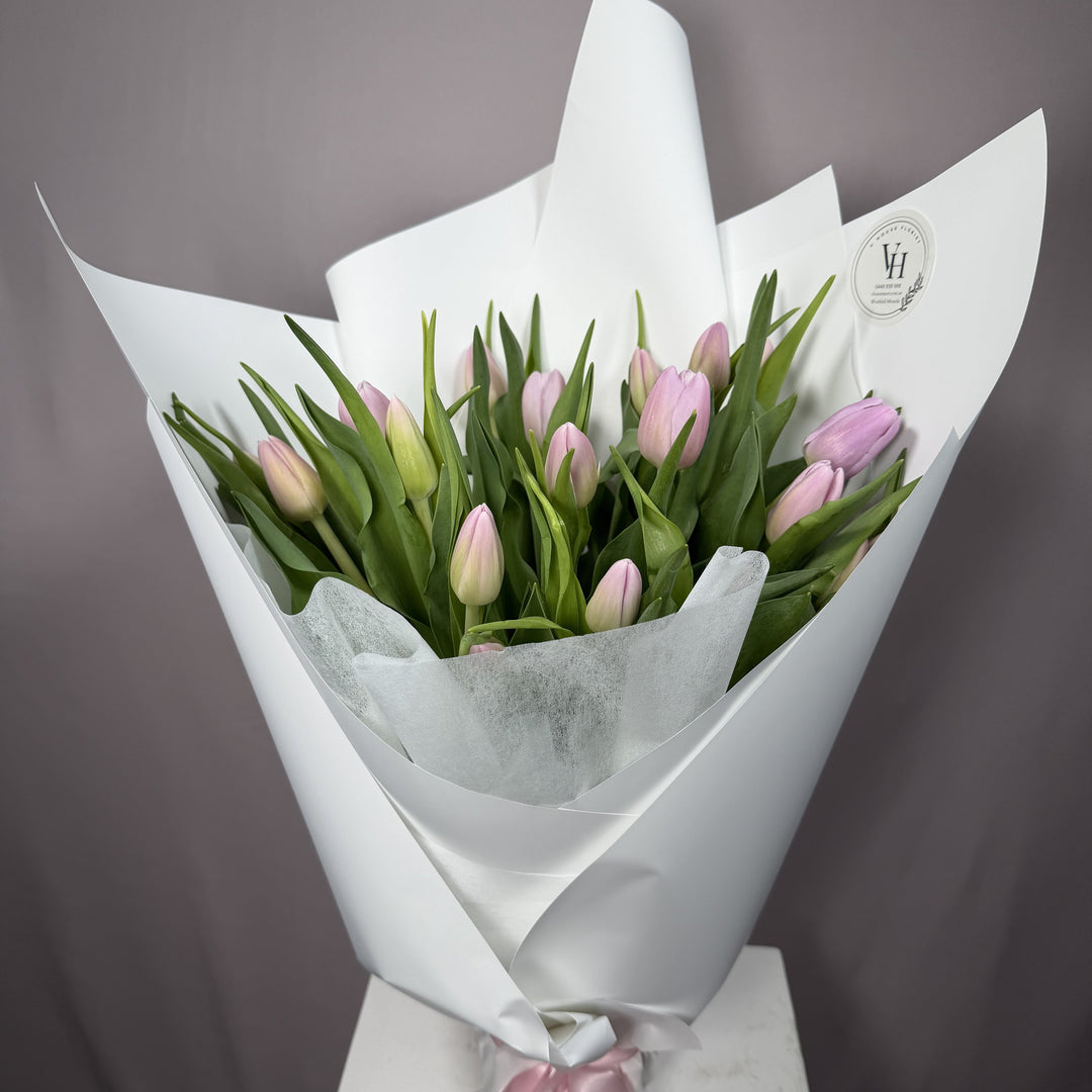 Pale blush pink tulip wrapped bouquet