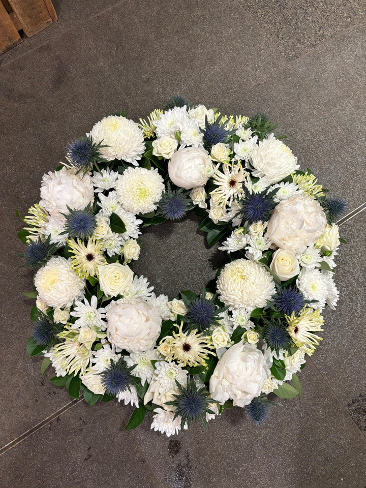 Classic white sympathy funeral wreath, same-day delivery Sydney