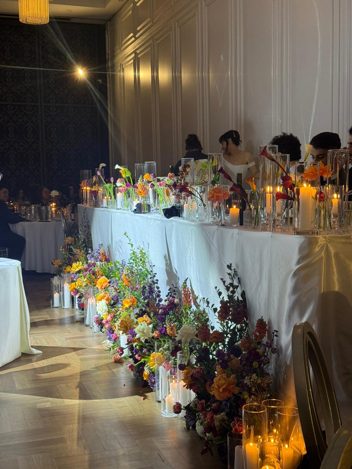 Romantic plum, burgundy and apricot wedding flowers for a church ceremony and Curzon Hall reception by Vhouse Florist