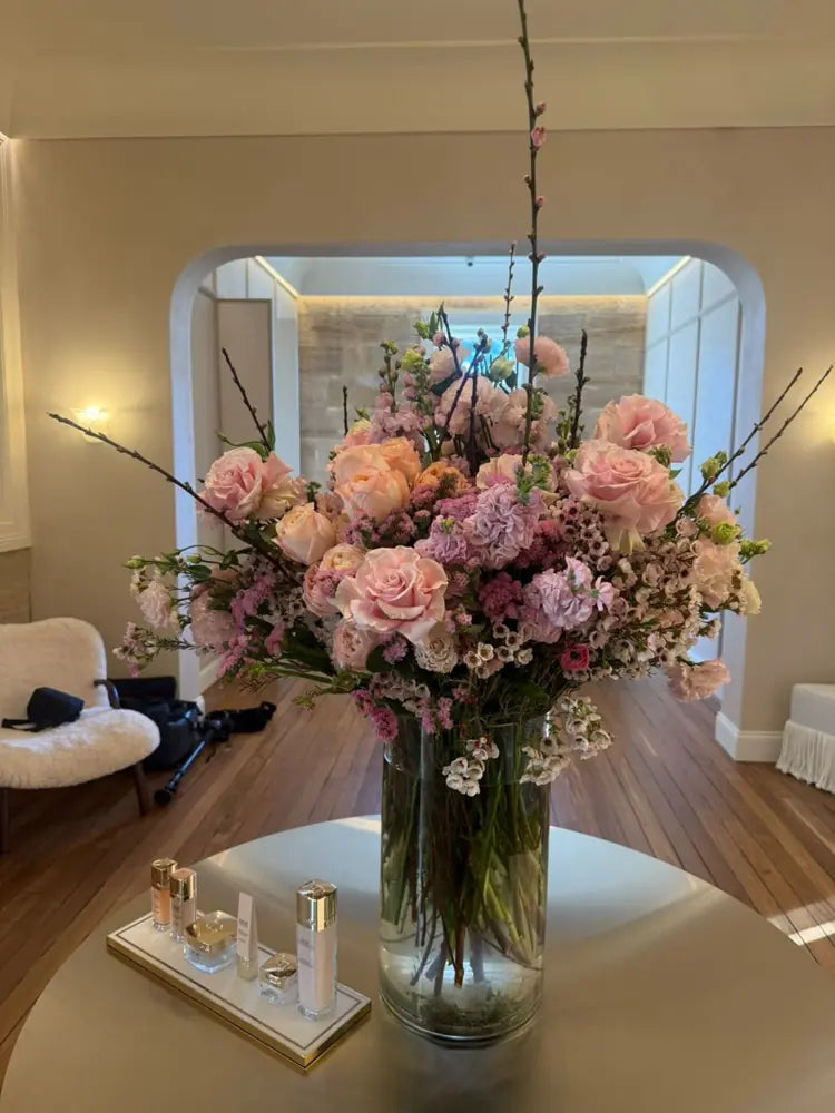 Corporate flower arrangement by Vhouse Florist on a boutique display table in Sydney