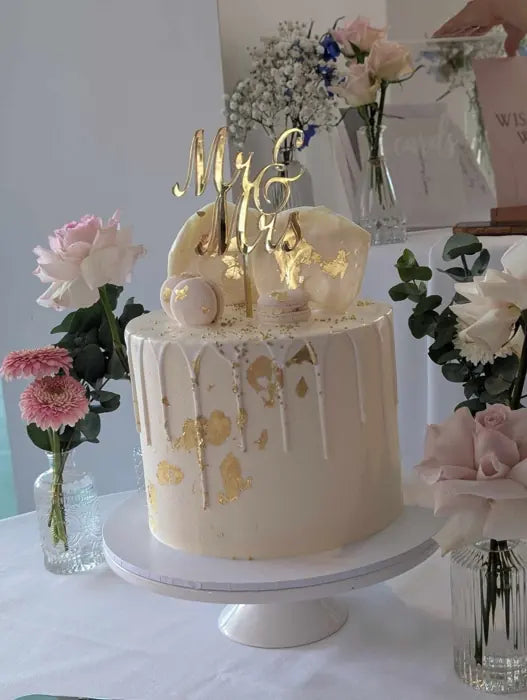 Wedding cake table with florals